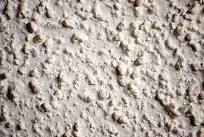 Textured popcorn ceiling risks